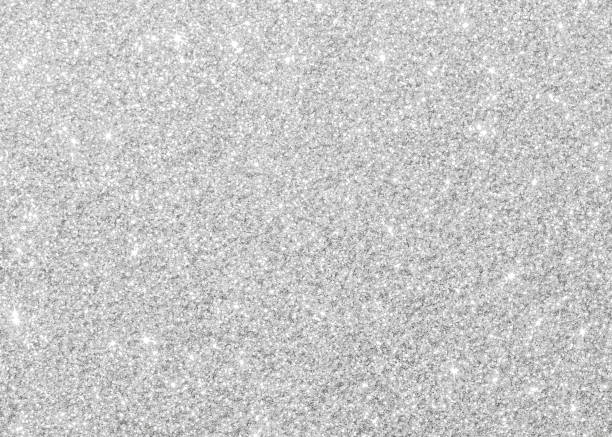 istock Silver glitter texture white sparkling shiny wrapping paper background for Christmas holiday seasonal wallpaper decoration, greeting and wedding invitation card design element 1077626346