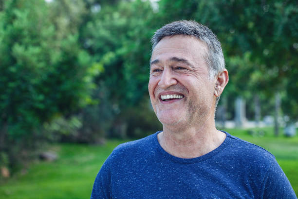 istock Happy mature male man smiling 1077633212