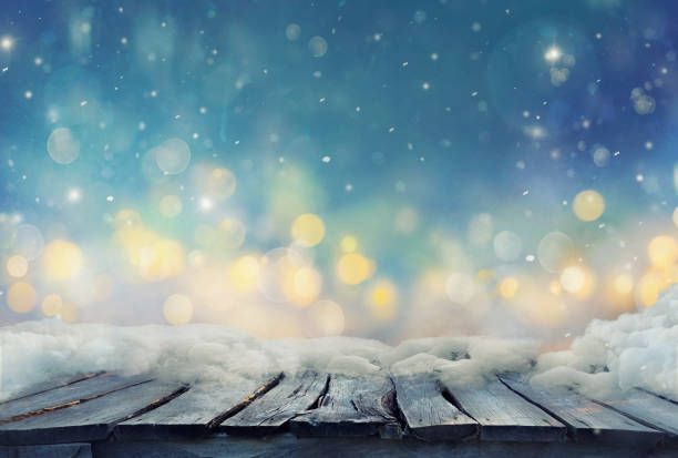 istock Winter design.  Christmas background with Frozen table. Blurred 1077639082