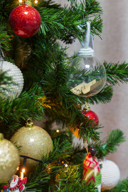 istock Christmas Tree of hanging decorative items including decor balls in sight 1077639894