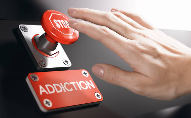 Psychology concept, Stop Addiction or Dependence Woman pressing a panic button with stop sign to overcome addiction or dependence problems. Psychology concept. addiction stock pictures, royalty-free photos & images