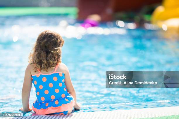 Adorable Toddler Girl Having Fun At The Water Park Stock Photo - Download Image Now - Swimming Pool, Safety, Child