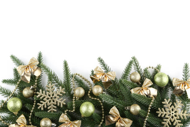 istock Christmas fir tree branches with decorations on white background 1077654050