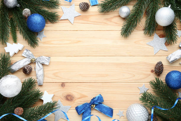 istock Colorful christmas decorations on wooden table 1077654164