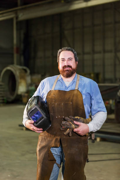 istock Welder in metal fabrication factory 1077656892