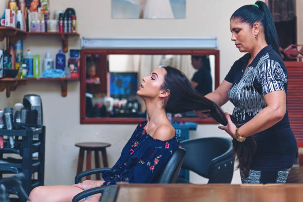 istock Hispanic women in a hair salon 1077663242