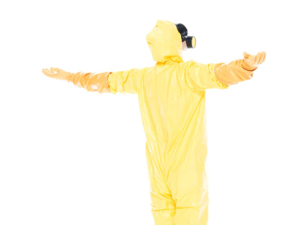 istock Man in protective clothing with arms outstretched 1077667498