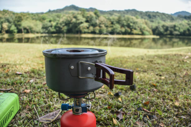 istock Cooking on the grass and camping,lake view 1077668362
