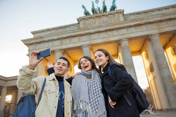 istock Friends taking a selfie at Brandeburg Gate in Berlin 1077668820
