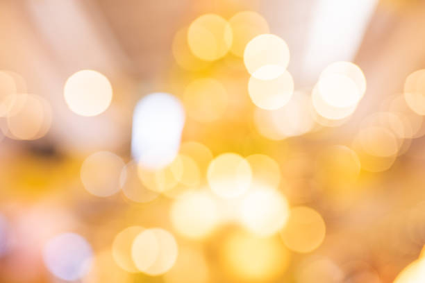 istock defocus of christmas tree background with shining lights 1077670300