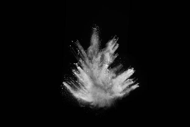 istock White powder explosion on black background. Colored cloud. Colorful dust explode. Paint Holi. 1077671290