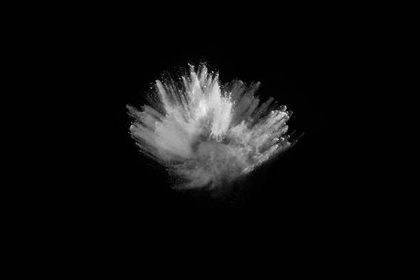 istock White powder explosion on black background. Colored cloud. Colorful dust explode. Paint Holi. 1077671318