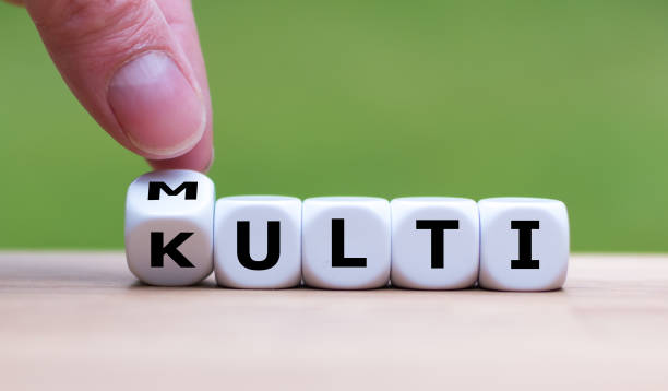 istock Dice form the words multi-kulti. A german phrase for multicultural. 1077671352