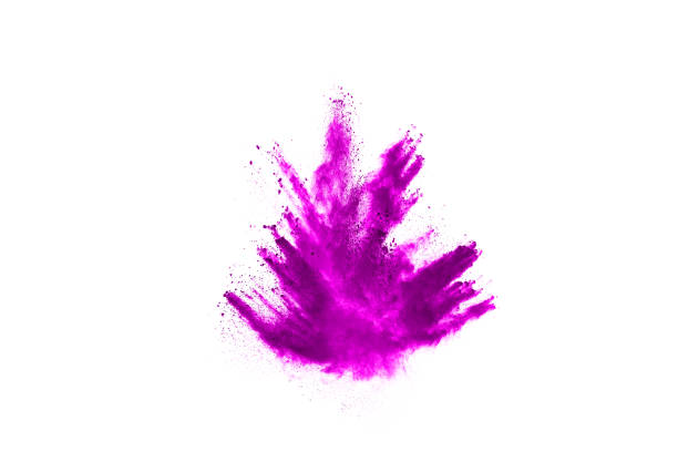 istock Freeze motion of purple color powder exploding on white background. 1077671382