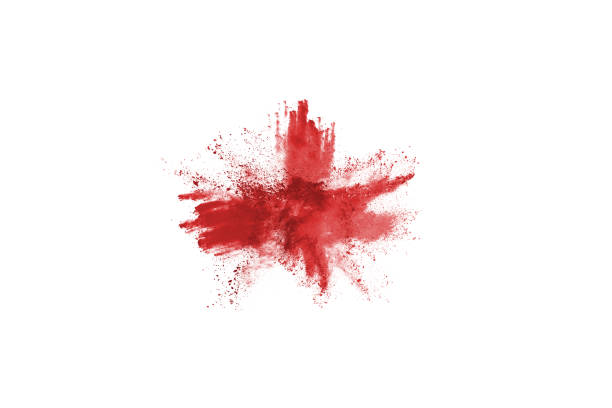istock Freeze motion of red powder exploding, isolated on white background. Abstract design of red dust cloud. Particles explosion screen saver, wallpaper 1077671630