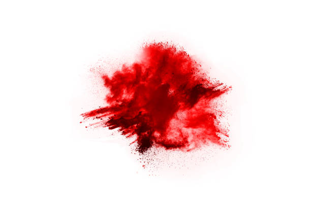 istock Freeze motion of red powder exploding, isolated on white background. Abstract design of red dust cloud. Particles explosion screen saver, wallpaper 1077671650