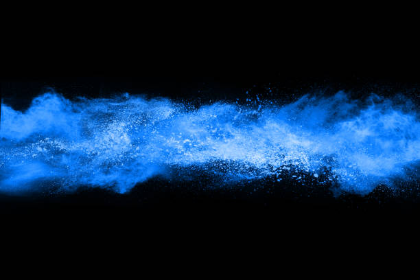 istock Blue powder explosion on black background. Colored cloud. Colorful dust explode. Paint Holi. 1077671964