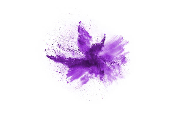 istock Freeze motion of purple color powder exploding on white background. 1077672010