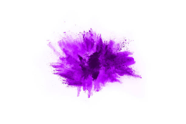 istock Freeze motion of purple color powder exploding on white background. 1077672020