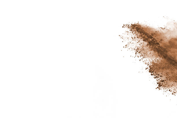 istock Brown color powder explosion on white background. Colored cloud. Colorful dust explode. Paint Holi. 1077678694