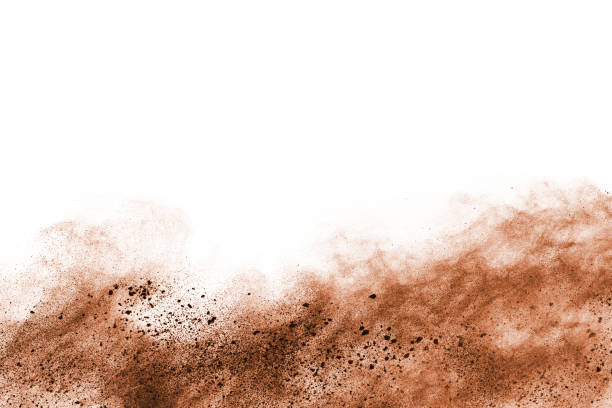 istock Brown color powder explosion on white background. Colored cloud. Colorful dust explode. Paint Holi. 1077678720