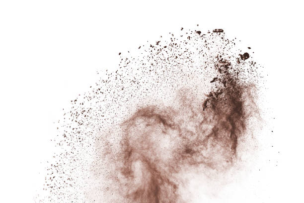 istock Brown color powder explosion on white background. Colored cloud. Colorful dust explode. Paint Holi. 1077678836