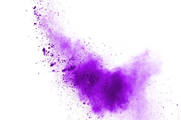 istock Freeze motion of purple color powder exploding on white background. 1077681100