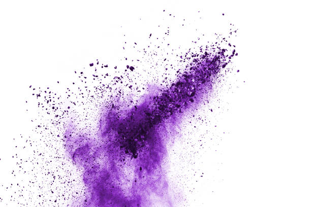 istock Freeze motion of purple color powder exploding on white background. 1077681140