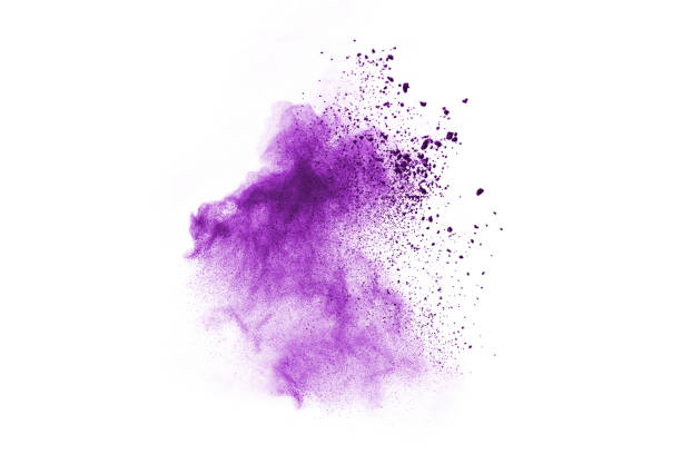 istock Freeze motion of purple color powder exploding on white background. 1077681172