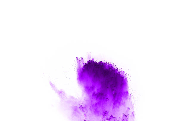 istock Freeze motion of purple color powder exploding on white background. 1077681194