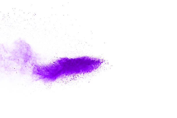 istock Freeze motion of purple color powder exploding on white background. 1077681202