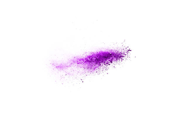istock Freeze motion of purple color powder exploding on white background. 1077681232