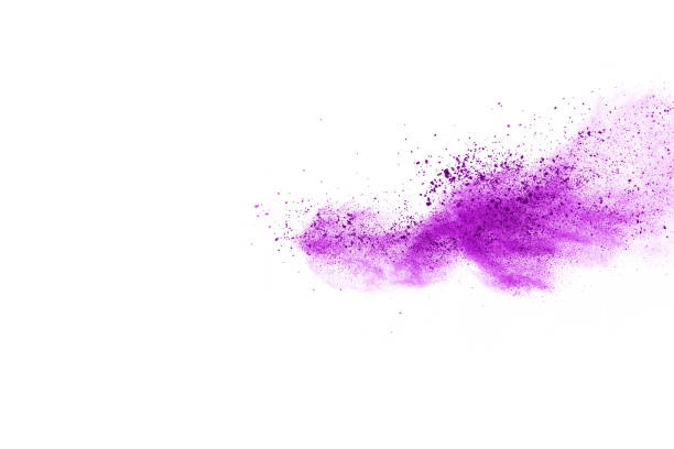 istock Freeze motion of purple color powder exploding on white background. 1077681244