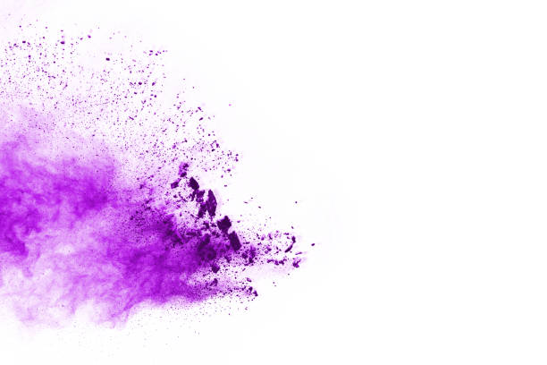 istock Freeze motion of purple color powder exploding on white background. 1077681258