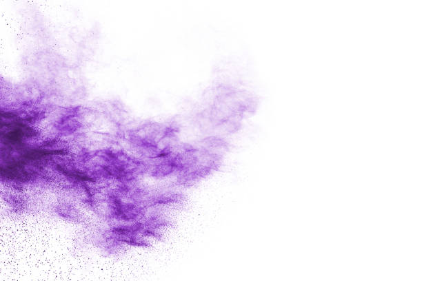 istock Freeze motion of purple color powder exploding on white background. 1077681260