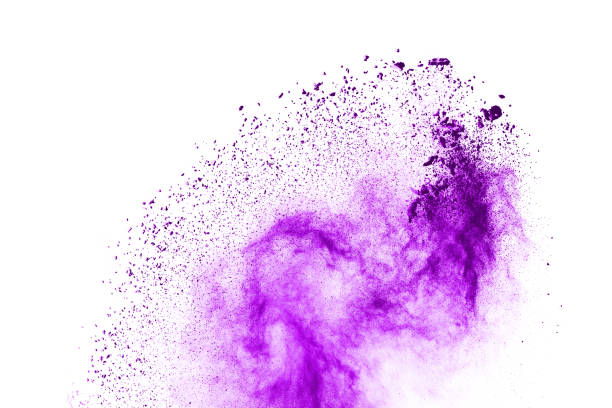 istock Freeze motion of purple color powder exploding on white background. 1077681482