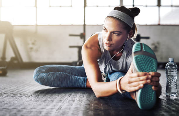 istock First I stretch then I do my intense exercises 1077684776