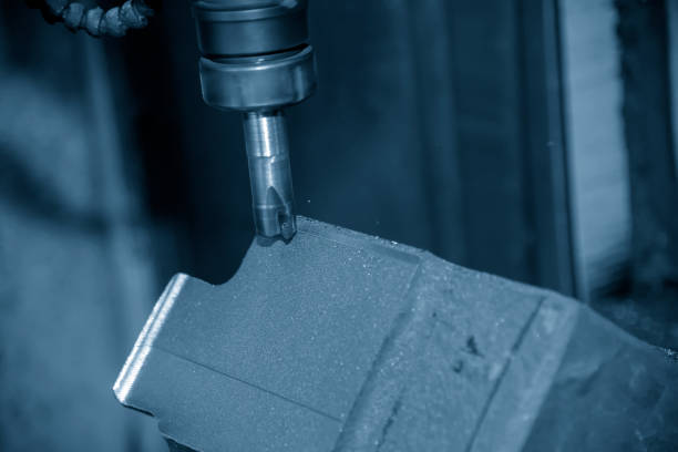 istock The  CNC milling machine cutting the cast iron  part . 1077685248