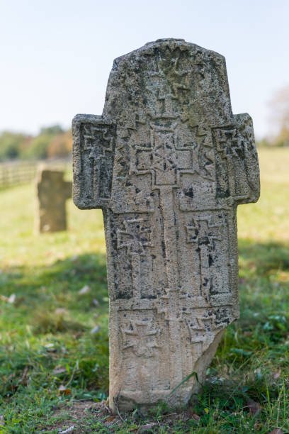 istock Old cemetery tombstones. 1077688136