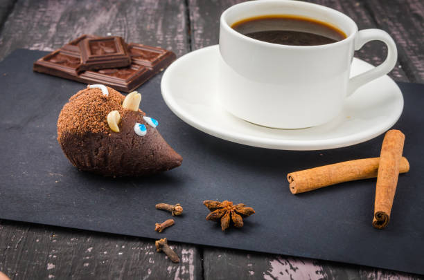 istock Coffee and sweets on a wooden table 1077689724