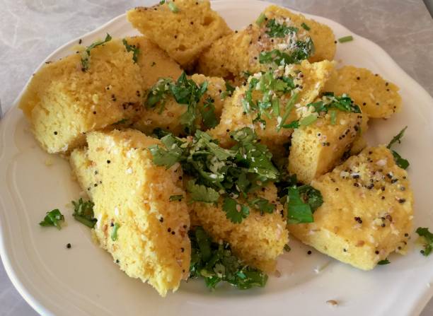 istock Indian Savoury Rice Cakes with garnish on plate 1077690580