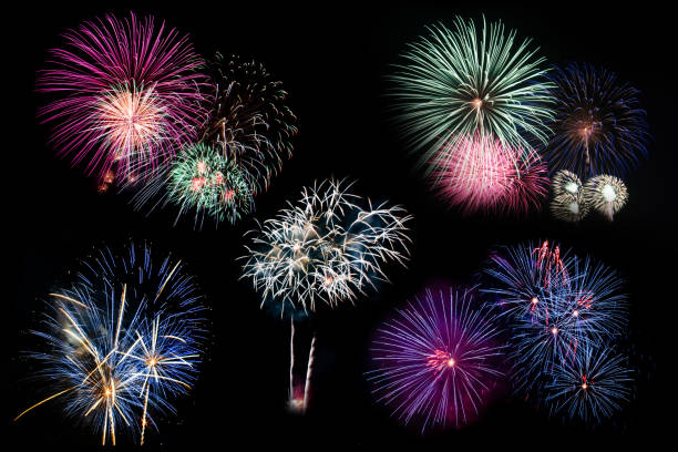 istock colorful fireworks on the black sky background over-water 1077700260