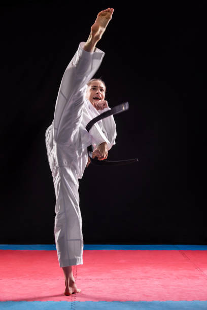 istock Girl practicing martial arts 1077702060