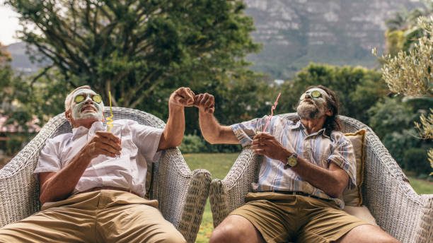 istock Senior friends enjoying spa treatment 1077710594