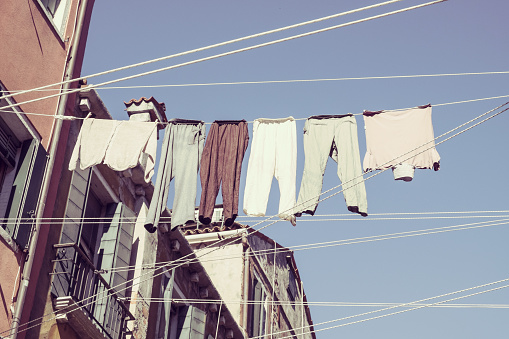 Drying clothes on street symbol