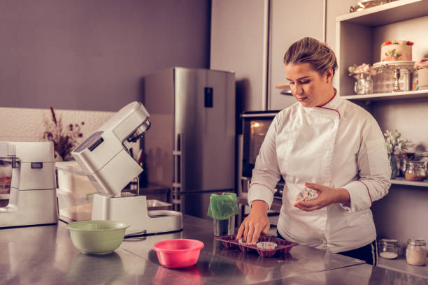 istock Professional famous pastry chef preparing chocolate muffins 1077719074