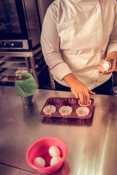 istock Top view of a muffin tray on the table 1077719084