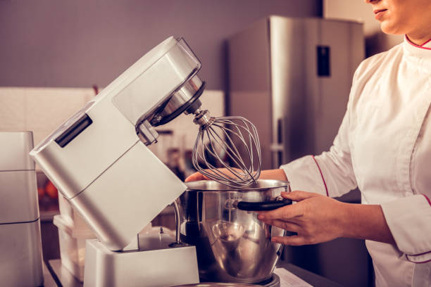istock Close up of a kitchen machine being in use 1077719410
