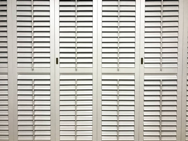istock Texture. White wooden shutters 1077719950
