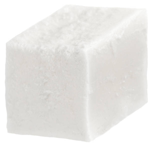 istock Cube of soft cheese isolated on a white background. With clipping path 1077720482